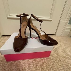 T-strap pumps in rich brown patent (faux) leather